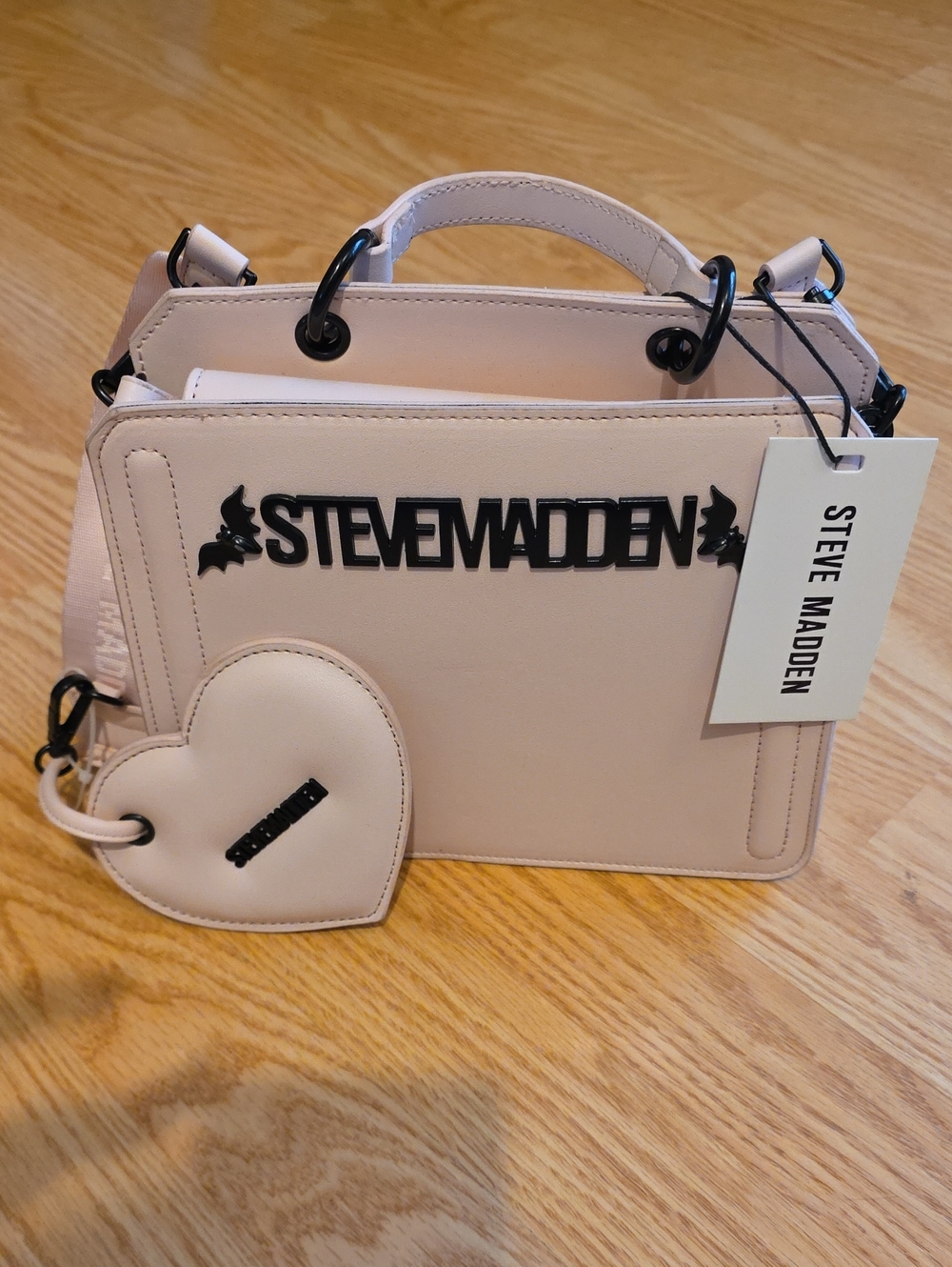 Steve Madden White Crossbody with Black Bats Logo